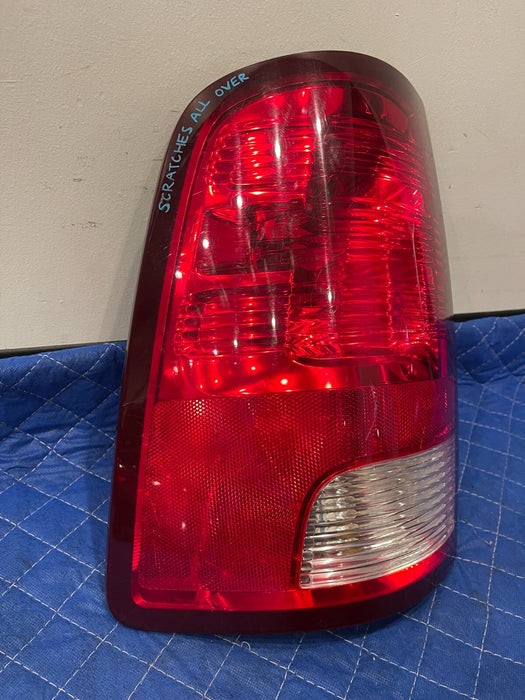 2017 DODGE RAM 2500 MEGA CAB REAR DRIVER LEFT TAIL LIGHT OEM *SCRATCHES*