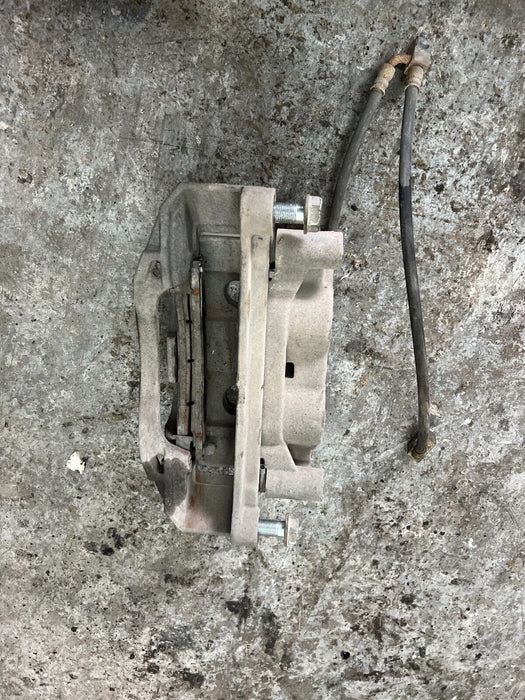 2016 2019 NISSAN TITAN XD FRONT DRIVER'S BRAKE CALIPER W/ BRAKE HOSE OEM