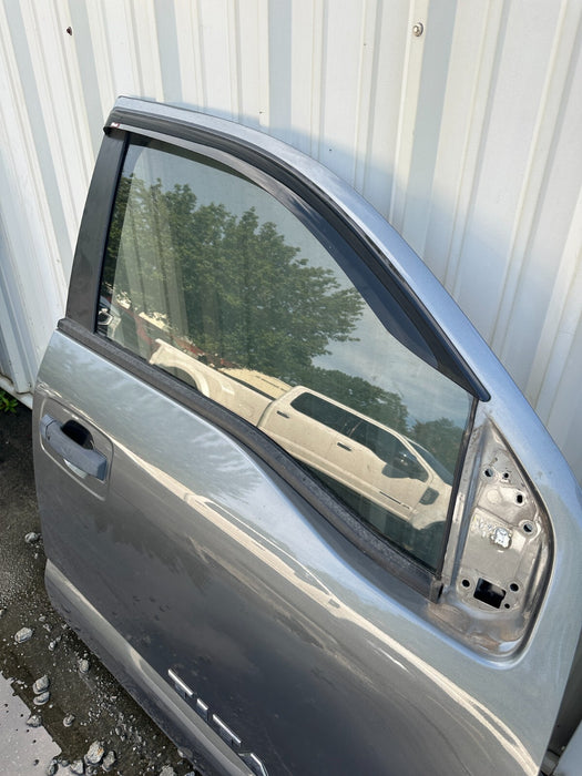 2016 Nissan Titan XD Crew Cab FRONT RIGHT DOOR SHELL GUN METALLIC (KAD) OEM