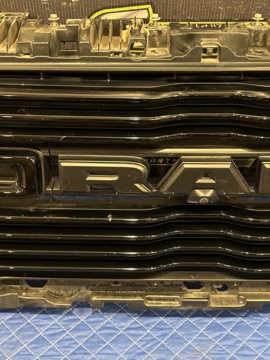 2021 RAM 2500 LARAMIE FRONT GRILLE W CAMERA OEM *FLAWS 4 & 8*