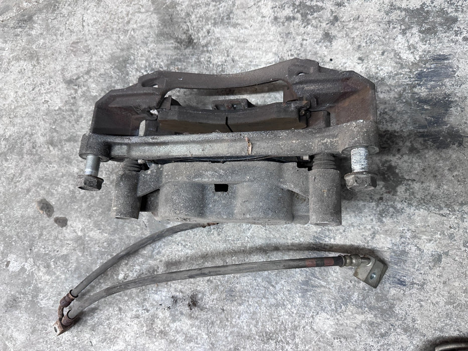 2017 NISSAN TITAN XD FRONT LEFT BRAKE CALIPER OEM