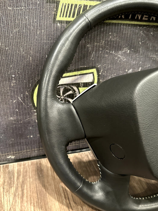 2016-19 NISSAN TITAN & XD LEATHER STEERING WHEEL W CRUISE OEM *READ/MINOR FLAWS*