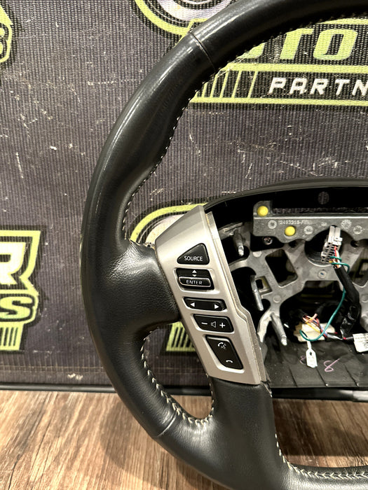 2016-19 NISSAN TITAN & XD LEATHER STEERING WHEEL W CRUISE OEM *READ/MINOR FLAWS*