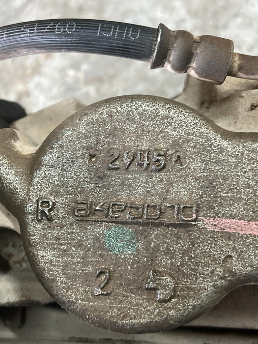 2016 2019 NISSAN TITAN XD FRONT DRIVER'S BRAKE CALIPER W/ BRAKE HOSE OEM