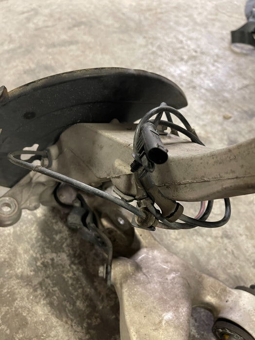 2016 NISSAN 370Z FRONT LEFT SUSPENSION KNUCKLE HUB ARM OEM 2009-2020