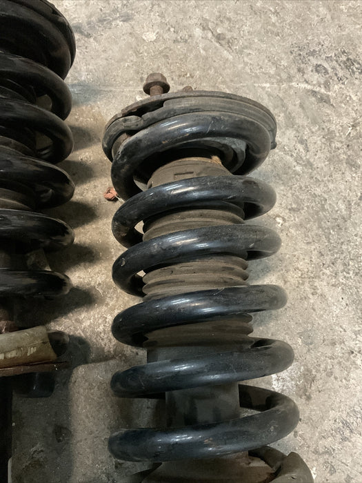 2004-2015 NISSAN TITAN FRONT STRUT SPRING SHOCK PAIR LEFT RIGHT OEM