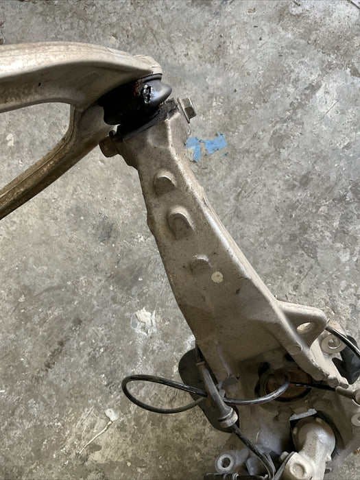 2010 NISSAN 370Z FRONT LEFT SUSPENSION KNUCKLE HUB CONTROL ARM OEM 2009-2020