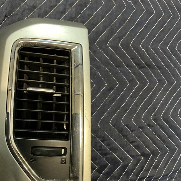 2016 NISSAN TITAN DRIVER CENTER AIR VENT WITH TRIM PANEL