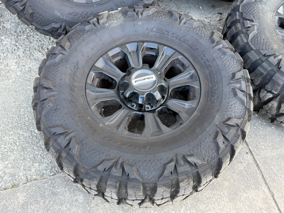 2005-2026 FORD F250 F350 TREMOR 18" WHEELS NEW 37X13.50 MUD GRAPPLERS SET 8X170