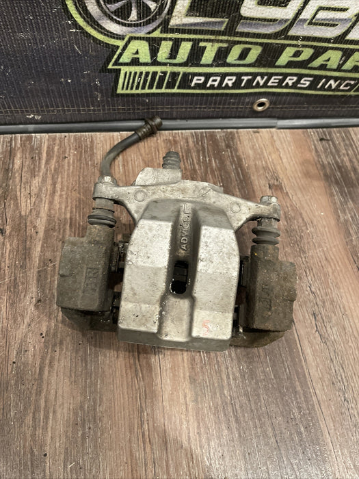 2014 TOYOTA PRIUS V REAR LEFT DRIVER BRAKE CALIPER ASSEMBLY OEM