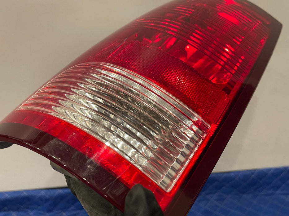 2017 DODGE RAM 2500 MEGA CAB REAR DRIVER LEFT TAIL LIGHT OEM *SCRATCHES*