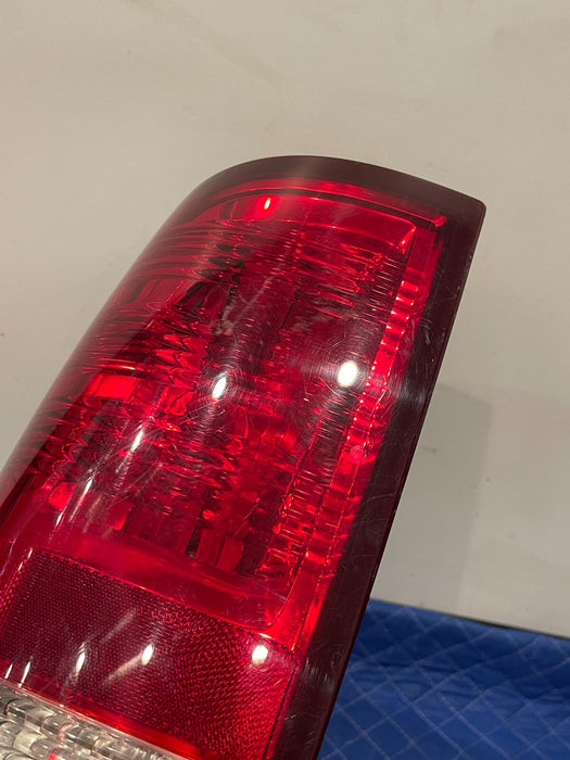 2017 DODGE RAM 2500 MEGA CAB REAR DRIVER LEFT TAIL LIGHT OEM *SCRATCHES*