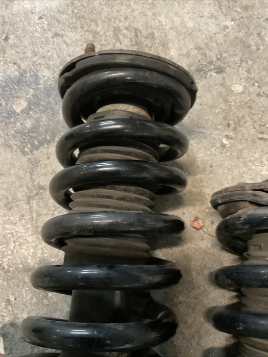 2004-2015 NISSAN TITAN FRONT STRUT SPRING SHOCK PAIR LEFT RIGHT OEM