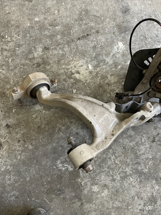 2010 NISSAN 370Z FRONT LEFT SUSPENSION KNUCKLE HUB CONTROL ARM OEM 2009-2020