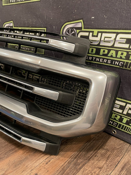 2020-22 FORD F250 PLATI FRONT BUMPER GRILLE OEM *READ/2 MISS CLIPS/NO EMBLEM*