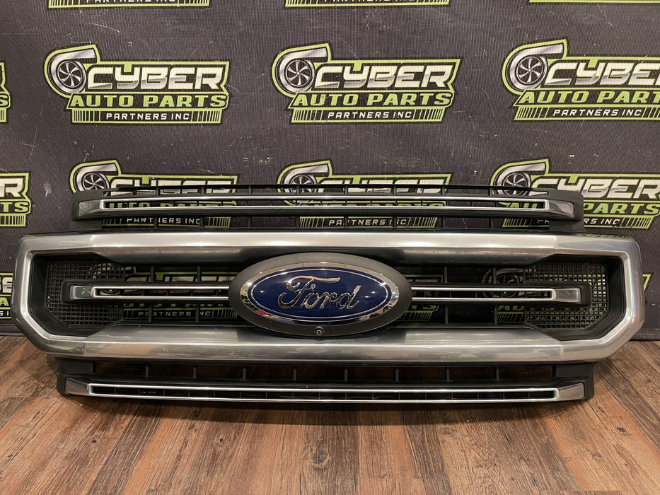 2020-22 FORD F250 PLATI FRONT BUMPER GRILLE OEM *READ/2 MISS CLIPS/NO EMBLEM*