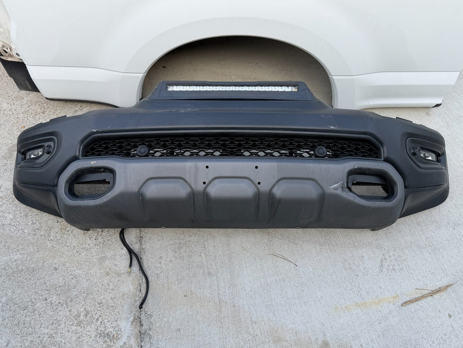 2021-2024 RAM 1500 TRX FRONT BUMPER ASSEMBLY W/ SENSOR HOLES *DAMAGE*