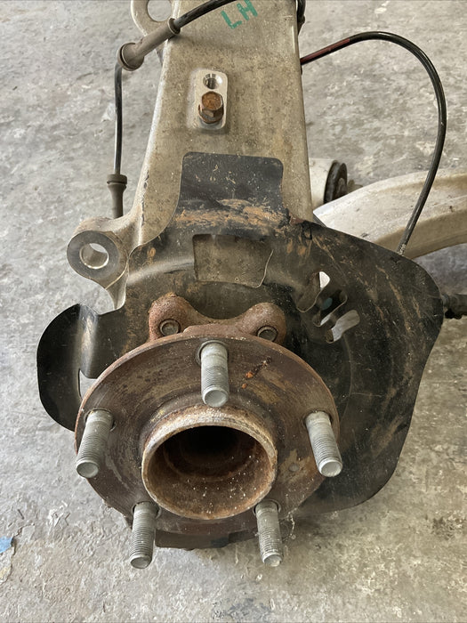 2010 NISSAN 370Z FRONT LEFT SUSPENSION KNUCKLE HUB CONTROL ARM OEM 2009-2020