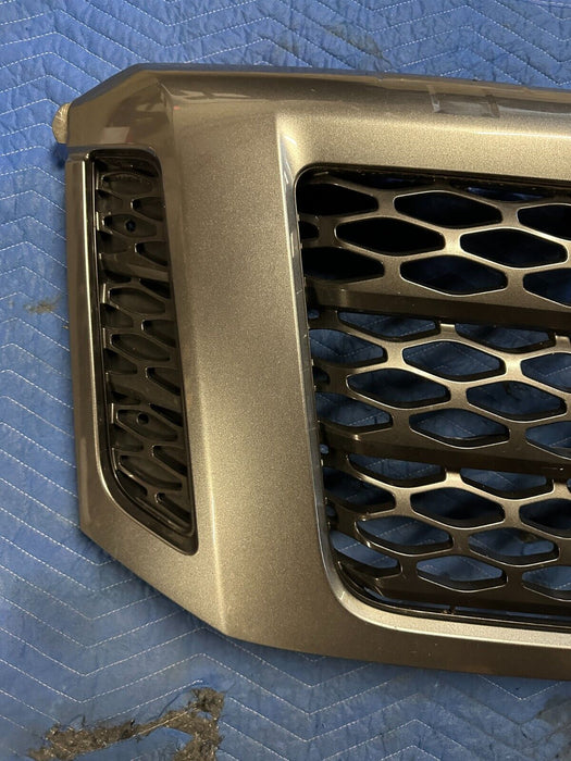 2016-2019 NISSAN TITAN XD PRO-4X GRILLE W/ CAMERA EMBLEM PAINTED GREY OEM