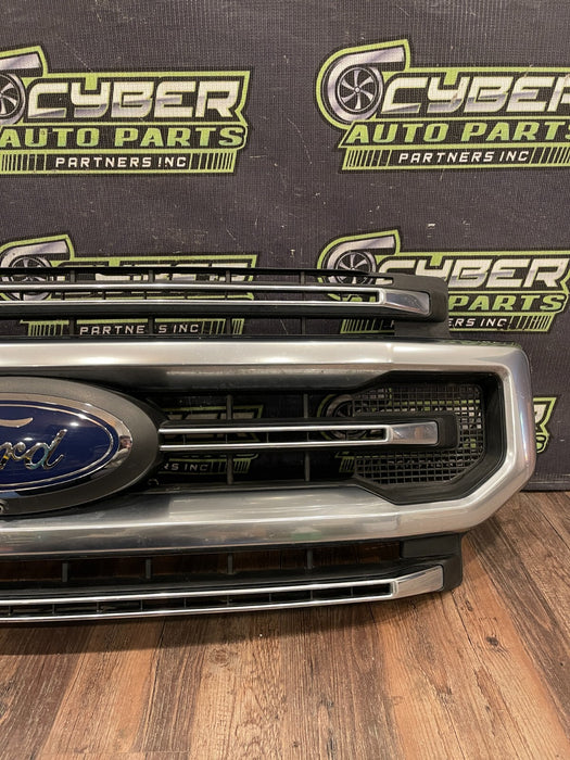 2020-22 FORD F250 PLATI FRONT BUMPER GRILLE OEM *READ/2 MISS CLIPS/NO EMBLEM*