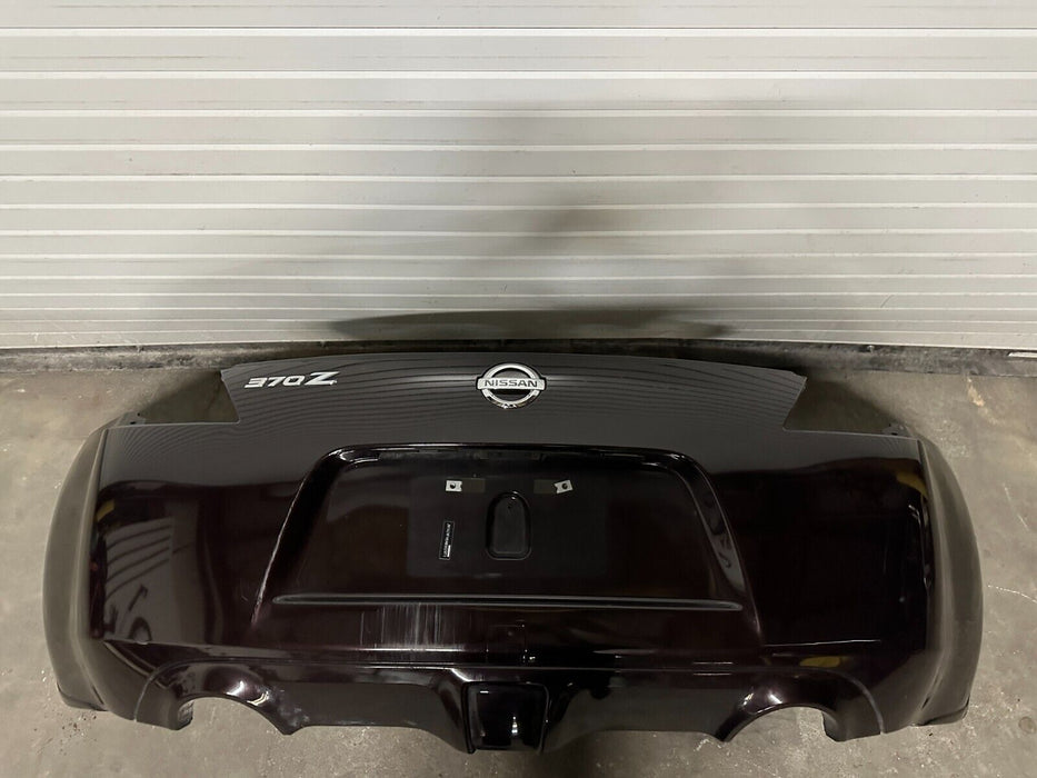 2010 NISSAN 370Z REAR BUMPER COVER BLACK CHERRY *NAG OEM ~MINOR WEAR/SCRATCHES~