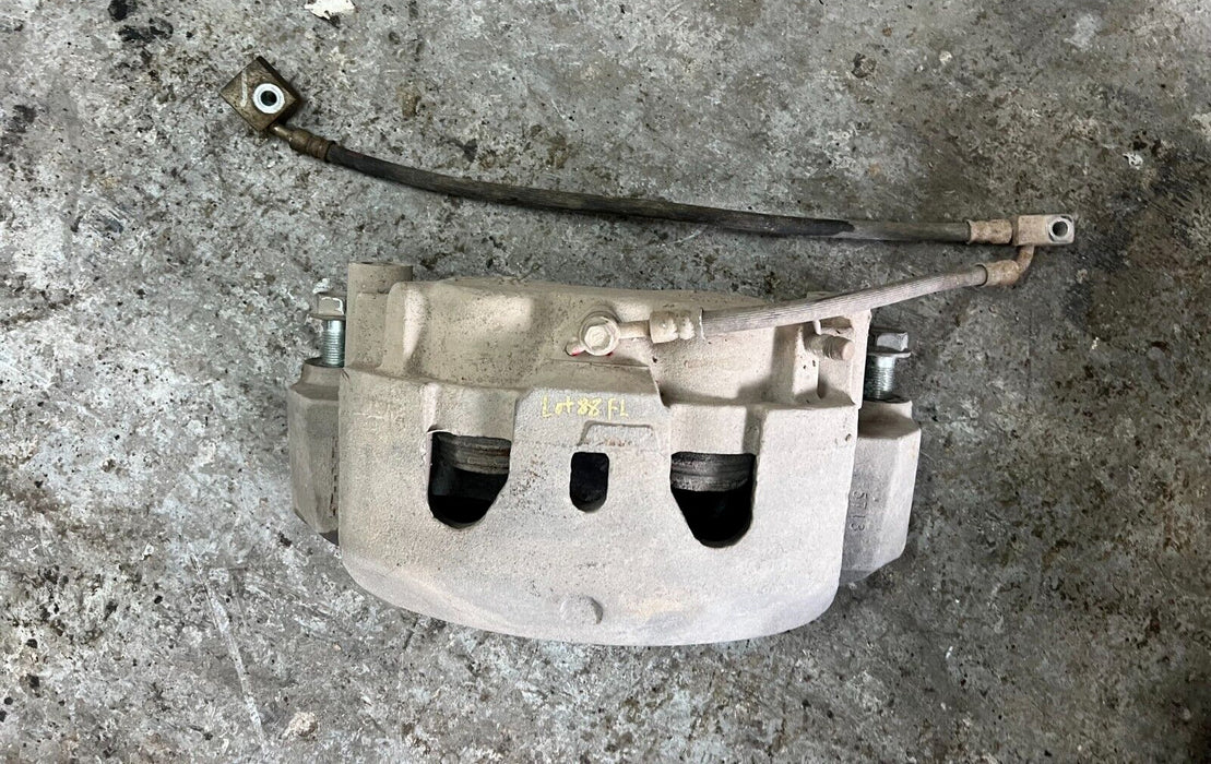 2016 2019 NISSAN TITAN XD FRONT DRIVER'S BRAKE CALIPER W/ BRAKE HOSE OEM