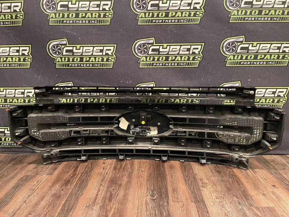 2020-22 FORD F250 PLATI FRONT BUMPER GRILLE OEM *READ/2 MISS CLIPS/NO EMBLEM*