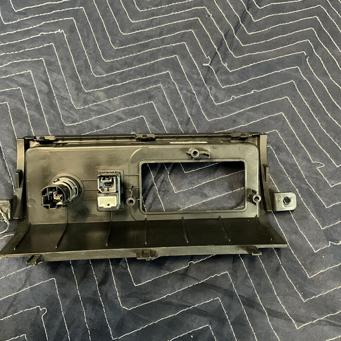 2018 Nissan Titan XD Center Dash Lower Lid Cover Trim W/ AUX Port & Outlet