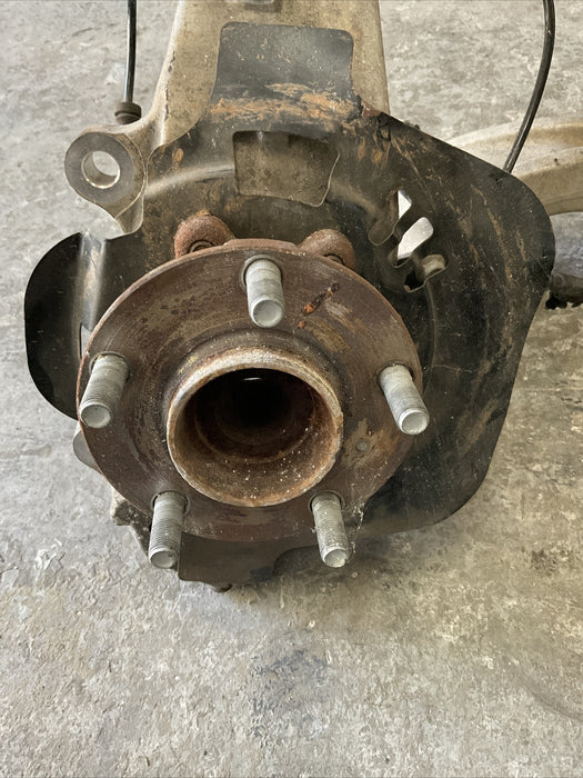 2010 NISSAN 370Z FRONT LEFT SUSPENSION KNUCKLE HUB CONTROL ARM OEM 2009-2020