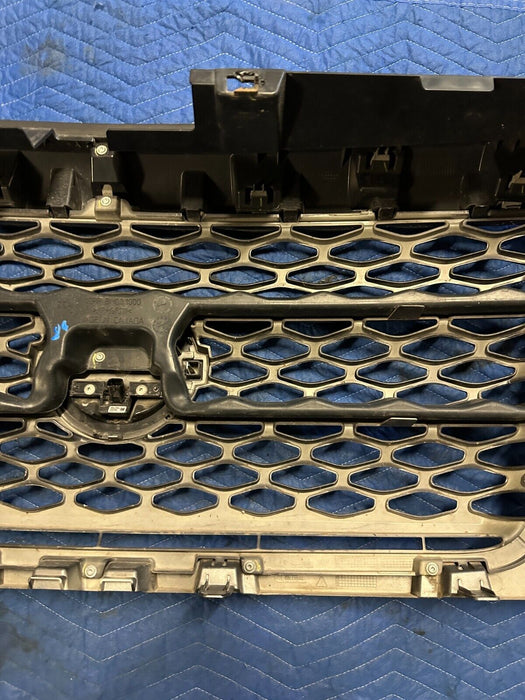 2016-2019 NISSAN TITAN XD PRO-4X GRILLE W/ CAMERA EMBLEM PAINTED GREY OEM