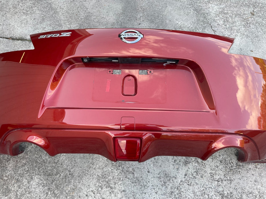 2009-2020 NISSAN 370Z REAR BUMPER COVER COMPLETE MAGMA RED OEM