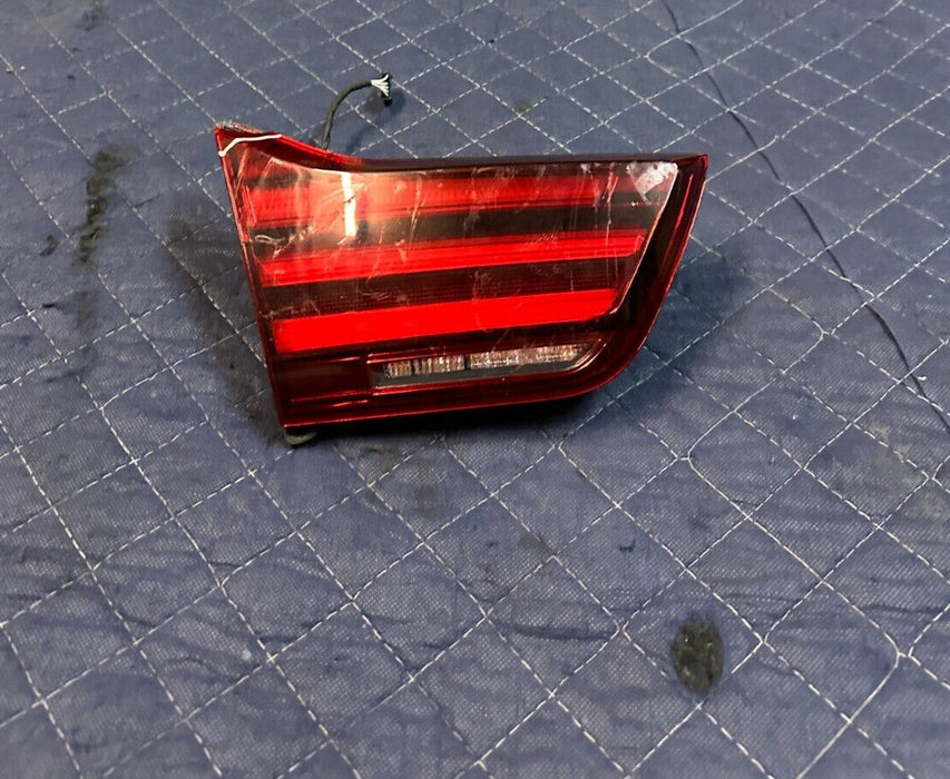 2015-2020 BMW M4 F82 COUPE LEFT INNER TRUNK TAIL LIGHT 63219491590 ~LENS CHIPPED