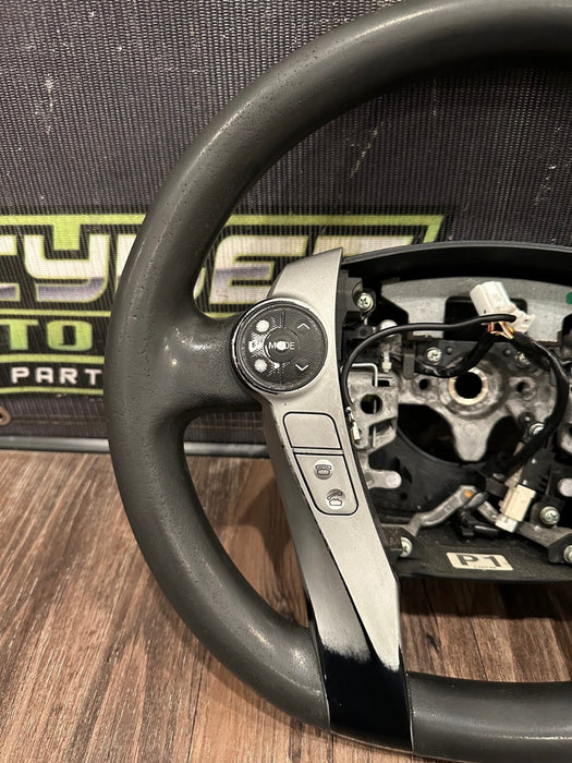 2014 TOYOTA PRIUS V BLACK LEATHER STEERING WHEEL OEM *WEAR* (READ DESCRIPTION)