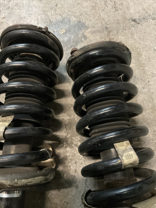 2004-2015 NISSAN TITAN FRONT STRUT SPRING SHOCK PAIR LEFT RIGHT OEM