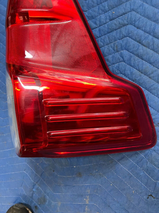 2016 2019 NISSAN TITAN XD DRIVER LEFT HALOGEN TAIL LIGHT 26555 EZ21D OEM