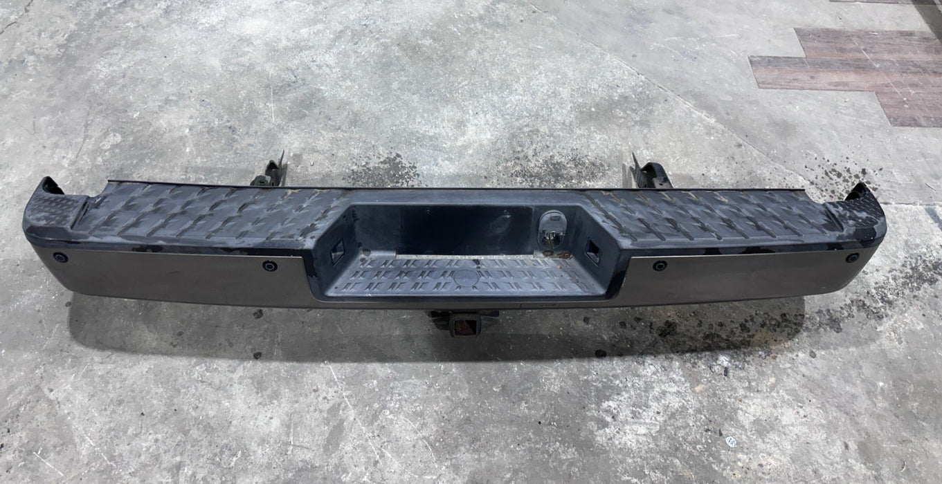 2017 NISSAN TITAN XD REAR BUMPER W SENSOR HARNESS & TOW HITCH OEM