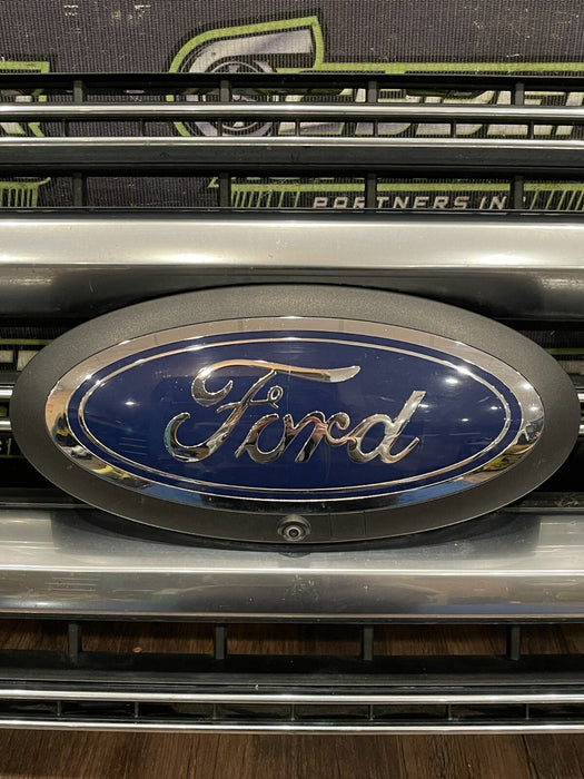 2020-22 FORD F250 PLATI FRONT BUMPER GRILLE OEM *READ/2 MISS CLIPS/NO EMBLEM*