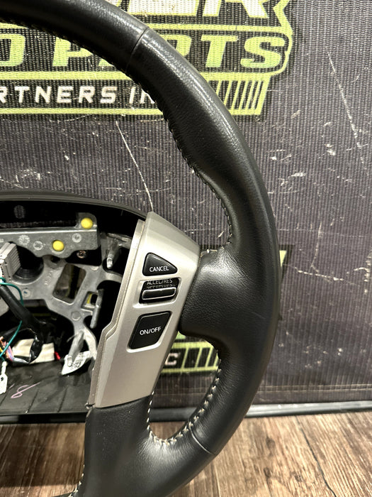 2016-19 NISSAN TITAN & XD LEATHER STEERING WHEEL W CRUISE OEM *READ/MINOR FLAWS*