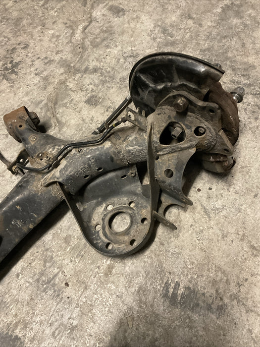 2014 TOYOTA PRIUS V REAR AXLE BEAM REAR SUSPENSION SUBFRAME ASSEMBLY OEM
