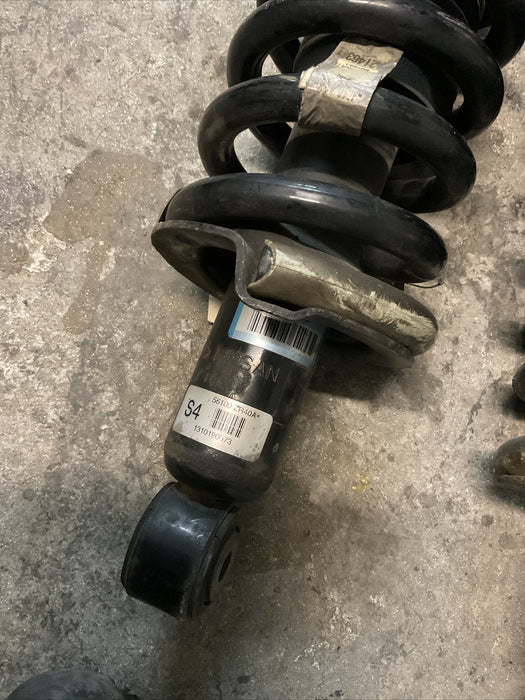 2004-2015 NISSAN TITAN FRONT STRUT SPRING SHOCK PAIR LEFT RIGHT OEM