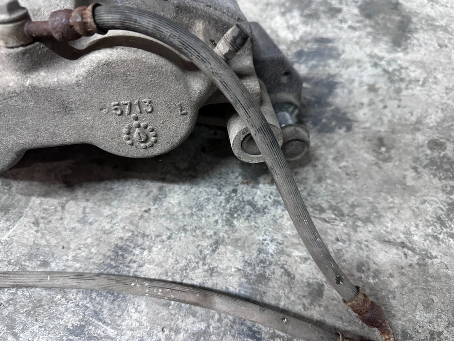 2017 NISSAN TITAN XD FRONT LEFT BRAKE CALIPER OEM