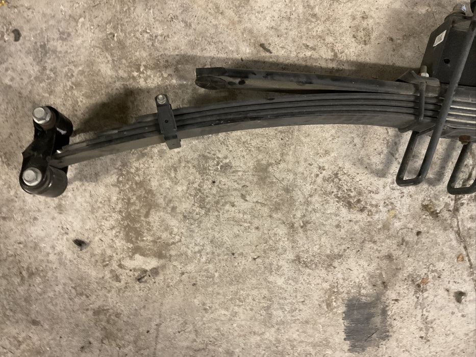 2020 GMC SIERRA 2500HD RIGHT LEAF SPRING WITH 6INCH LIFT BLOCK OEM