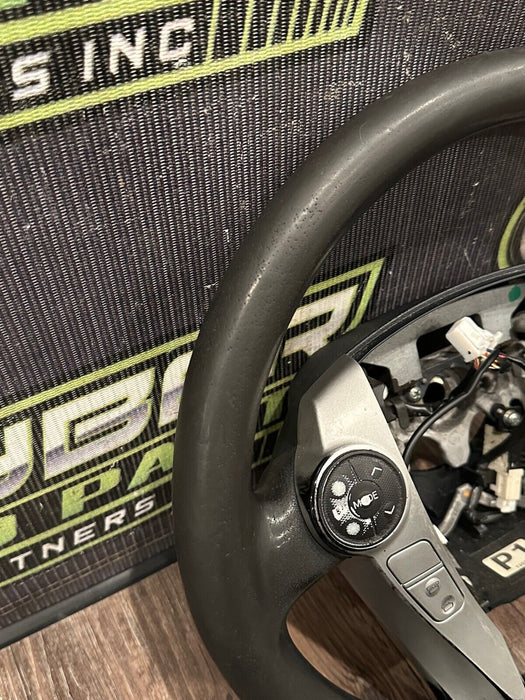 2014 TOYOTA PRUIS V BLACK LEATHER STEERING WHEEL OEM *WEAR* (READ DESCRIPTION)